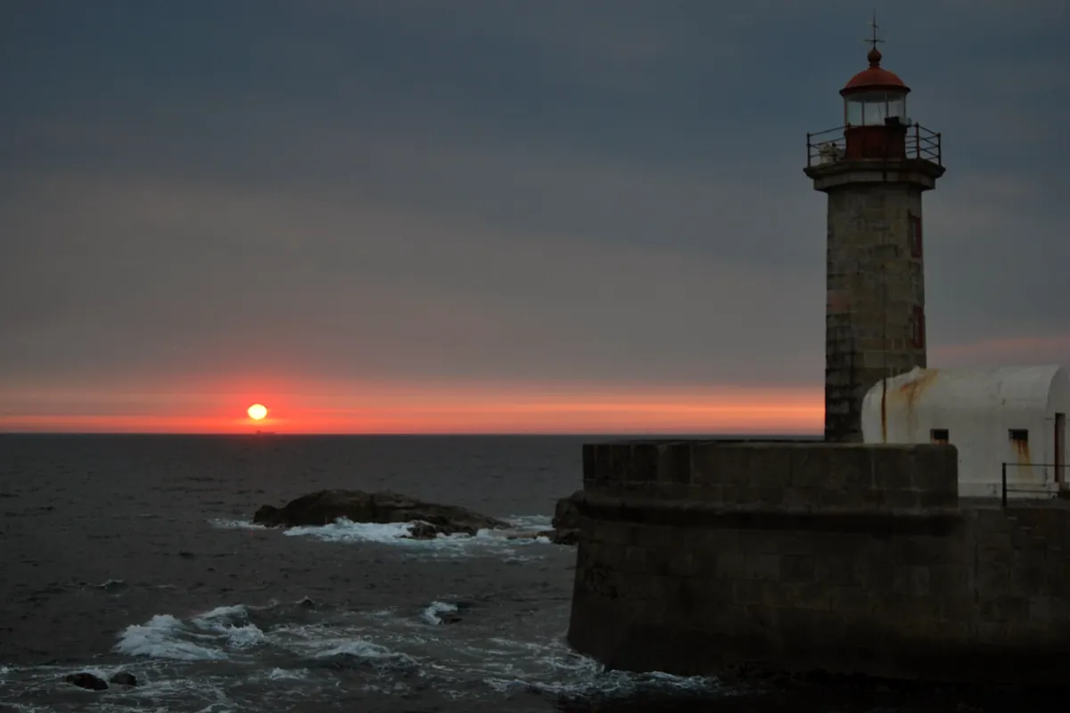 Sunset behind the Felgueiras lighthouse at Foz